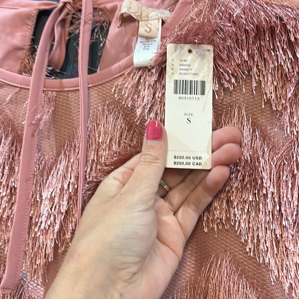 Pink chevron fringe shift dress.